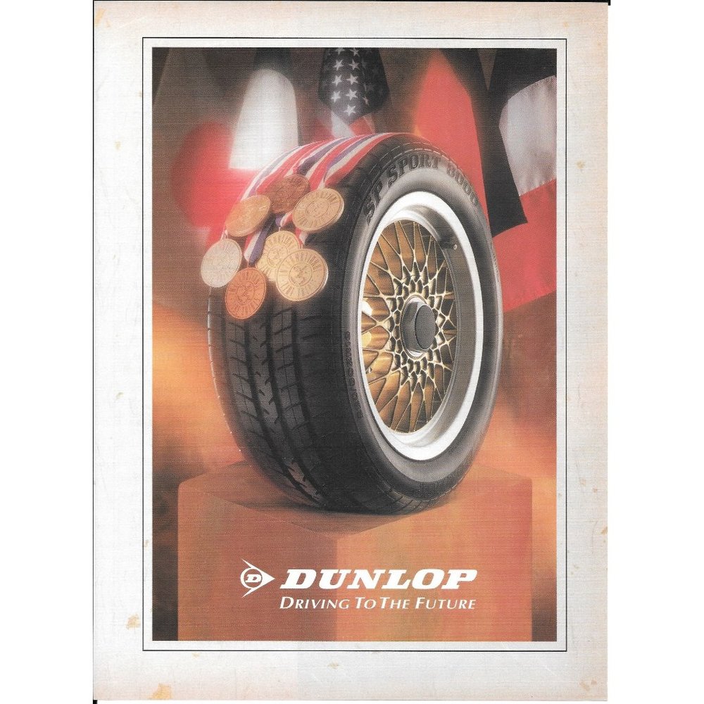 Dunlop Tires Driving to the Future Vintage Print Ad Medals Gold Medal Tire Wheel